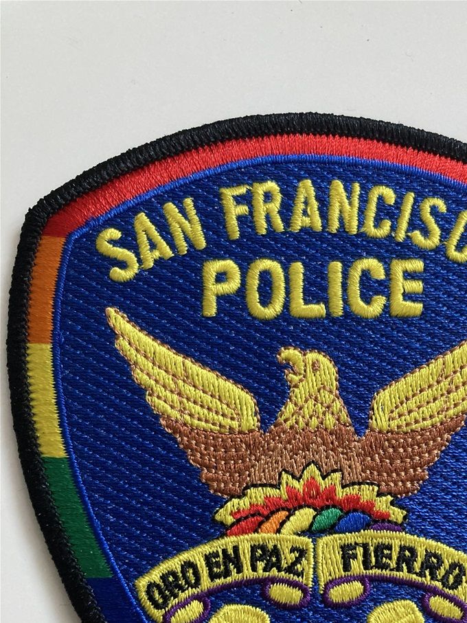 San Francisco Pridemärke, “Oro en paz, fierro en guerra” (Gold in peace, iron in war)